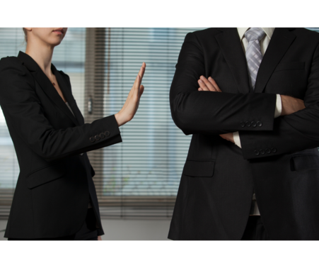 woman giving "stop" gesture to man for post on personal boundaries